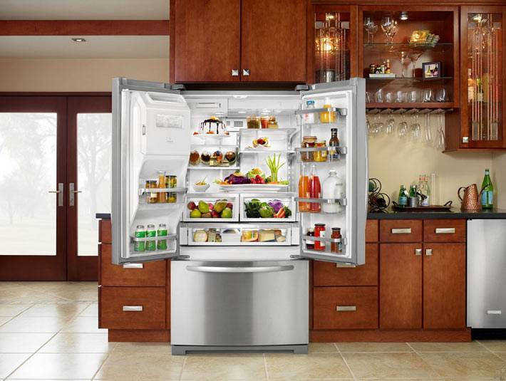 большой двухкамерный холодильник Whirlpool фото