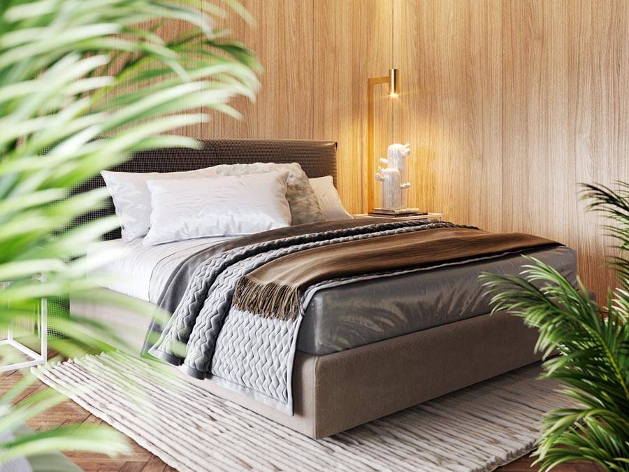 интерьер спальни с деревянными стенами и большой кроватью