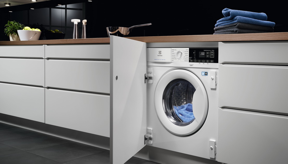 Встраиваемая стиральная машина в интерьере: виды, плюсы и минусы